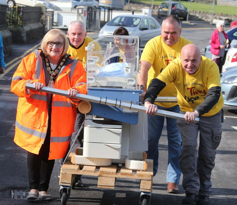 The Mayor of Causeway Coast and Glens Borough Council Councillor Brenda Chivers pictured with her team of volunteers as they begin the Incubator Push from Portstewart Town Hall to The Crannagh on the Portstewart Road outside Coleraine.