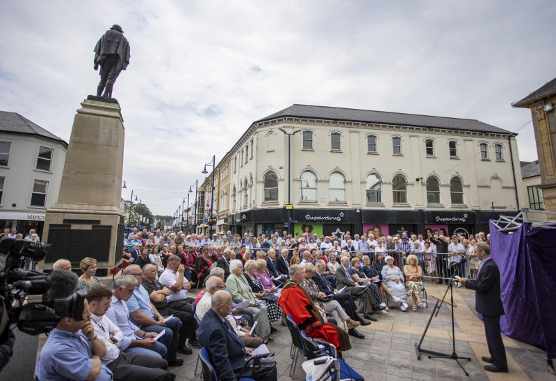 Crowds gather to mark the 50th anniversary of the Coleraine bomb and unveiling of a permanent memorial to those who lost their lives.