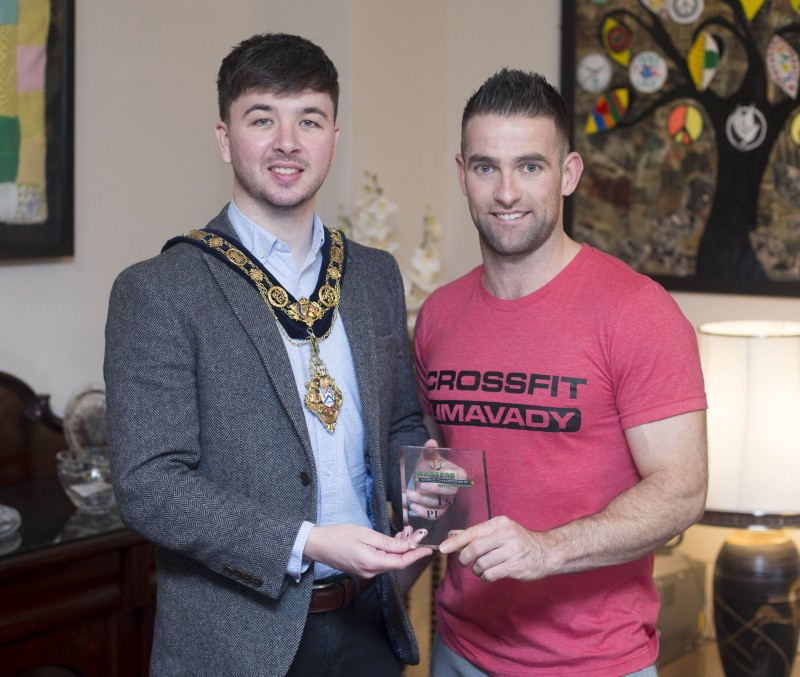 The Mayor of Causeway Coast and Glens Borough Council Councillor Sean Bateson pictured with Michael Walsh from CrossFit Limavady at a recent reception to mark his success at the International Functional Fitness Federation IF3 World Championships in Australia, where he won the 35-39 age category.
