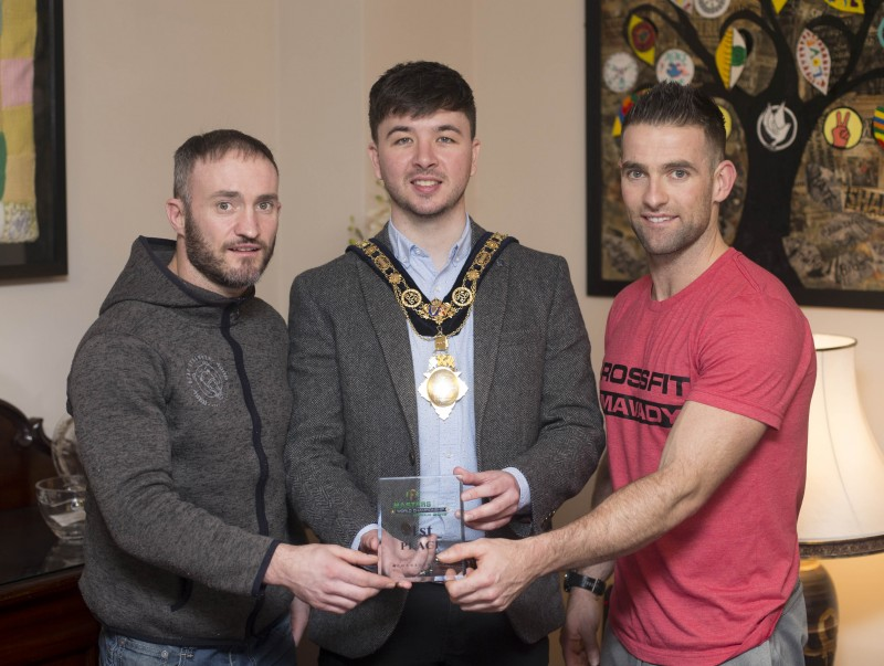 The Mayor of Causeway Coast and Glens Borough Council Councillor Sean Bateson recently hosted a reception for Michael Walsh who took 1st place at the International Functional Fitness Federation- IF3 World Championships in Australia, within the 35-39 age group category. Michael is pictured along with his CrossFit Limavady business partner Andy Chapman.