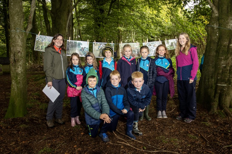 Pupils from St Peter’s and St Paul’s Primary School Foreglen, with Grace McAllister of the Causeway Coast and Glens Heritage Trust and Museum Services’ Museum Officer, Jamie Austin.