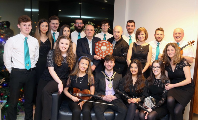 The Mayor of Causeway Coast and Glens Borough Council Councillor Sean Bateson pictured with members of Ceoltóirí Crosskeys.