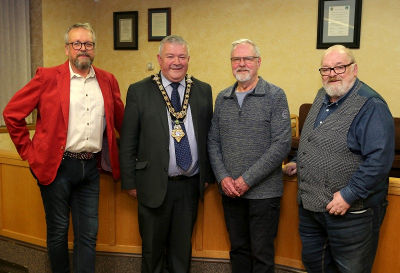 The Mayor of Causeway Coast and Glens Borough Council, Councillor Ivor Wallace, with Martin Magee, Roger Perritt and Peter Molloy, members of Friends of Ballycastle Museum.