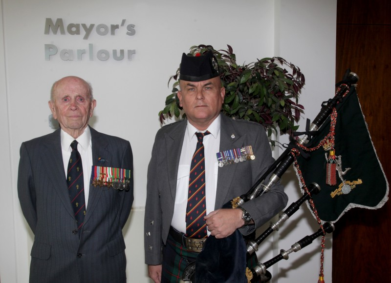 Norman Irwin pictured at the event in Cloonavin with piper John Taylor.