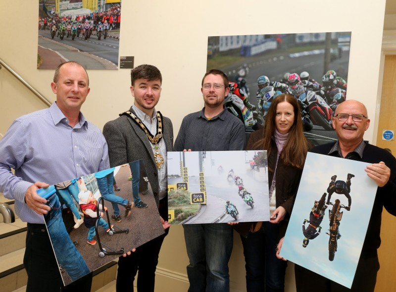 The Mayor of the Causeway Coast and Glens Borough Council, Councillor Sean Bateson pictured with Fergus Mackay, Event Operations Manager of the NW200, Dr Nicholas Wright, Museum Service Community Engagement Officer, Jane Blakely, winner in the Open Category and Wilbert McIlmoyle, one of the People’s Choice winners in this year’s ‘Capture the Moment’ International NW 200 photography competition.