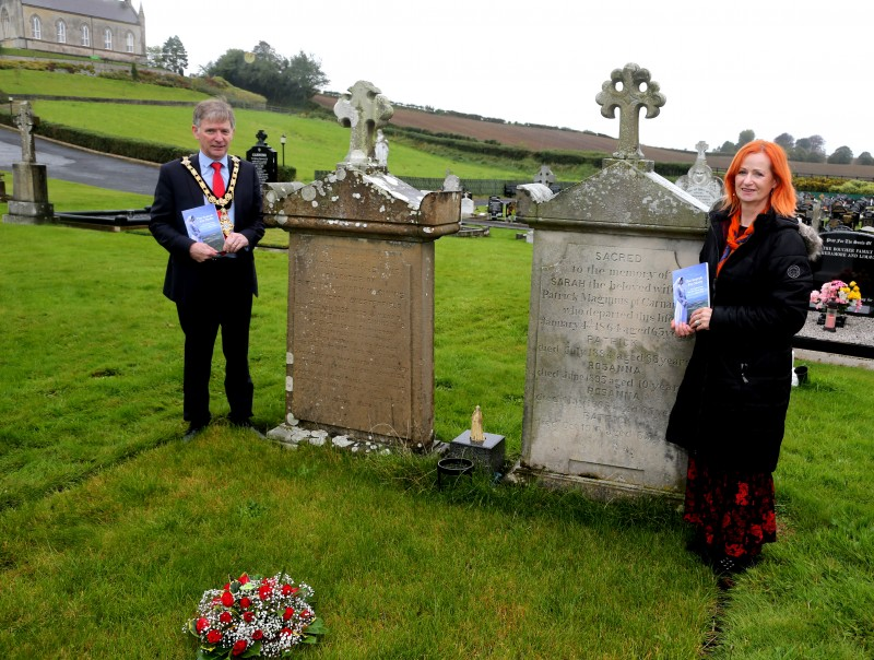 The Mayor of Causeway Coast and Glens Borough Council Alderman Mark Fielding and Rosemary Henderson who wrote the book, pictured at the grave of Sister Molly McGinnis.