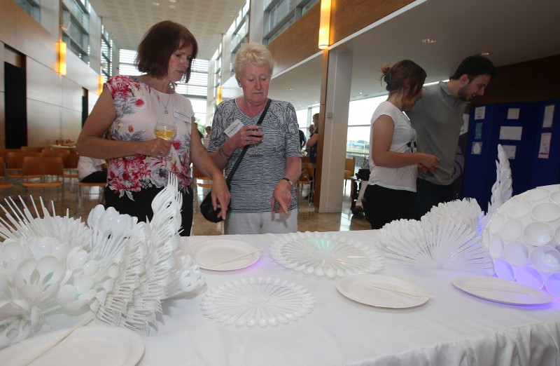 Admiring the 'Uniform of Debris' art installation.