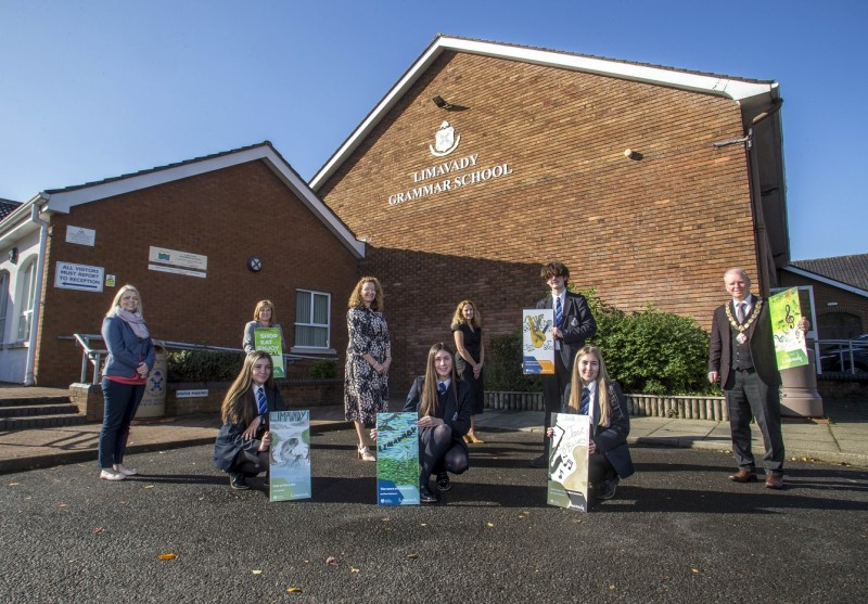 Limavady Grammar School pupils and staff with their winning designs. The new town centre banners tell the story of the area and give a warm welcome for residents, shoppers and visitors while promoting the importance of ‘Shop Eat Enjoy Local’