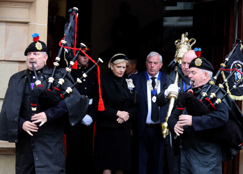 Pipers lead the Lord Lieutenant of County Londonderry, Mrs Alison Millar, and the High Sheriff, Mr George Glover, from Coleraine Town Hall for the Accession Proclamation for County Londonderry held in Coleraine on Sunday 11th September 2022.