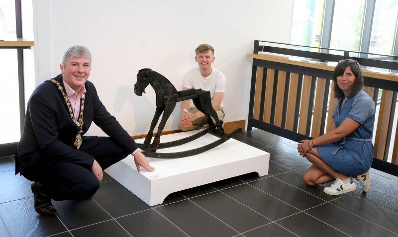 Mayor of Causeway Coast and Glens Borough Council, Councillor Richard Holmes views the work of artist Matthew Wilson at the ‘Under the Same Sun' exhibition