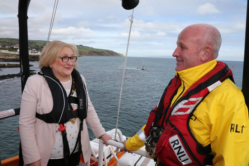 The Mayor of Causeway Coast and Glens Borough Council Councillor Brenda Chivers chats with Coxswain Paddy McLaughlin.