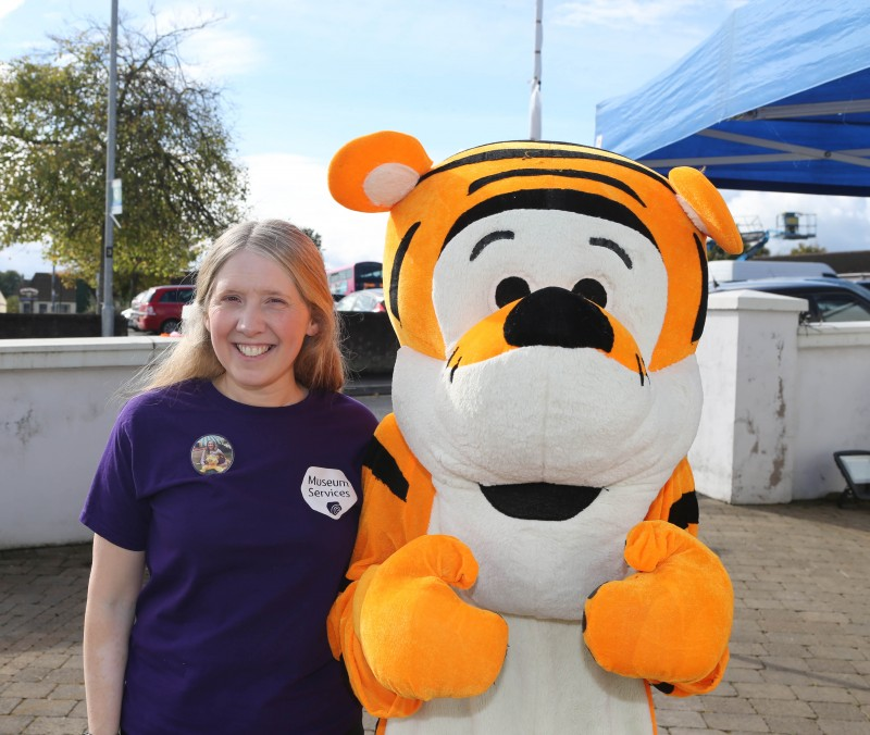 Jamie Austin, Museum Officer pictured with the popular Tiger walkabout character at the Causeway Safari Tale Fun Day held in Ballymoney Museum.