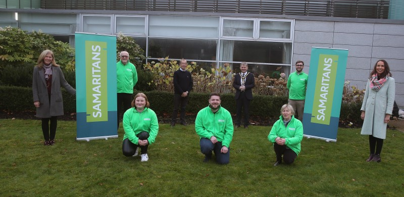 Left – right, Elaine Moore, Brendan Magee, Charlotte Craig, David McKeown, Colin Taylor, the Mayor of Causeway Coast and Glens Borough Council Alderman Mark Fielding, Chris Eastwood, Councillor Chris McCaw and Councillor Stephanie Quigley pictured at Cloonavin for the launch of the Samaritans Christmas campaign at Cloonavin, which will light up in green on December 21st as a symbol of support for the charity.