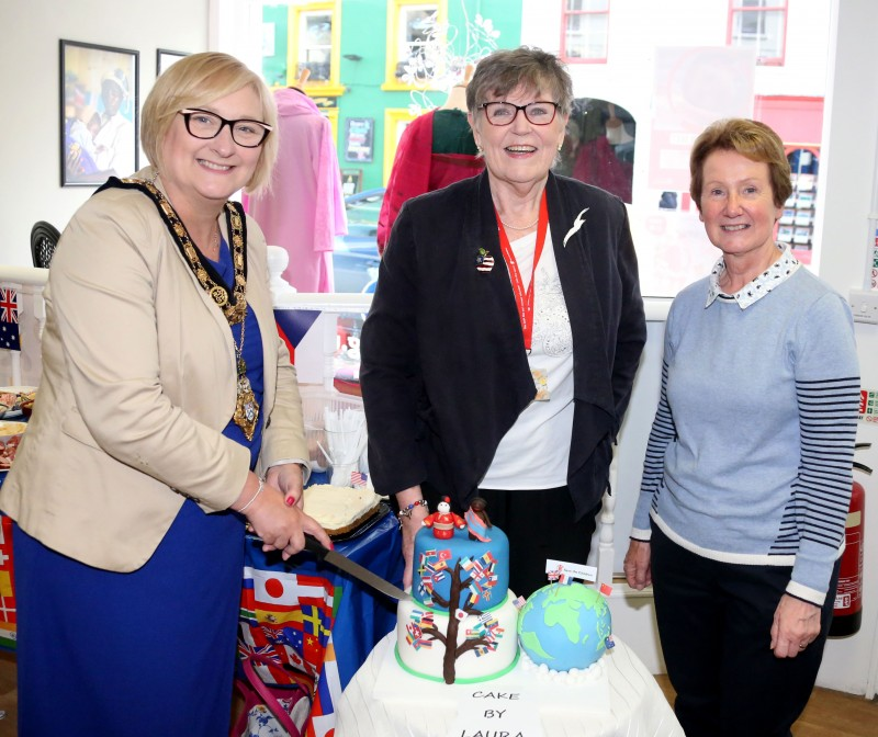 The Mayor of Causeway Coast and Glens Borough Council, Councillor Brenda Chivers pictured celebrating World International Day of Peace with Petra Allan and Niamh Mc Comish at the Save the Children shop in Ballycastle.