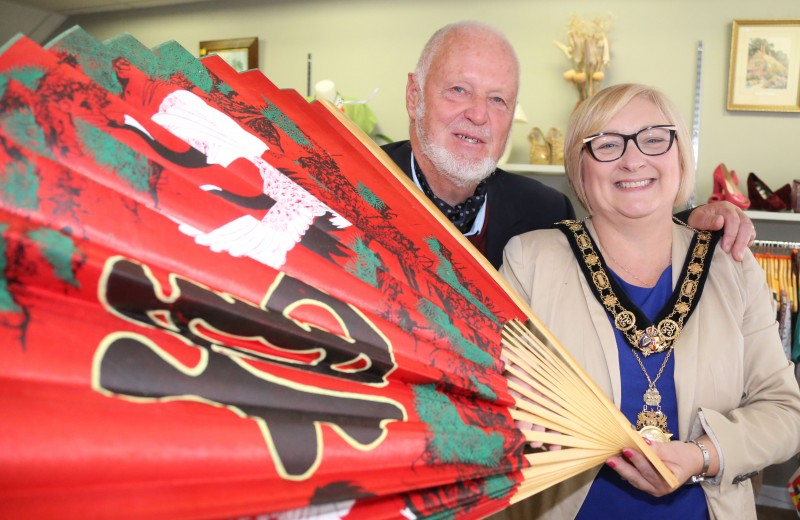 The Mayor of Causeway Coast and Glens Borough Council, Councillor Brenda Chivers pictured with Chris Mc Caughan at the World International Day of Peace event as the Save the Children shop in Ballycastle.