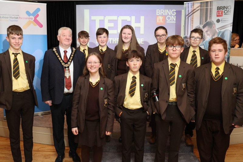 Mayor of Causeway Coast and Glens, Councillor Steven Callaghan with students from Cross and Passion College.