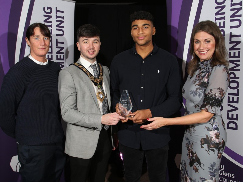 Sportsman of the Year Calum Brown (Gaelic Football) pictured with the Mayor of Causeway Coast and Glens Borough Council Councillor Sean Bateson, Master of Ceremonies Sarah Travers and Gill Small representing award sponsor Smallcost Carpets.