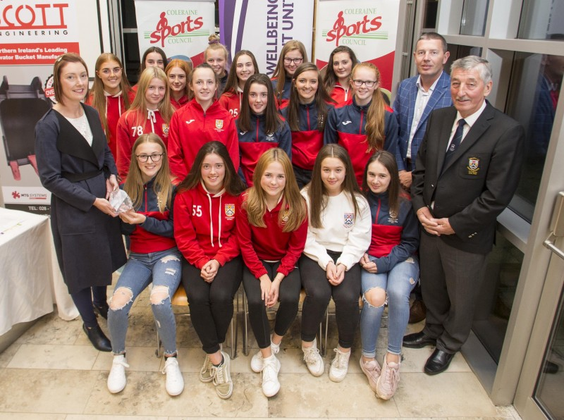 Representatives from Coleraine Hockey Club’s U-15 squad, winners of the Merit Award pictured with Nigel and Amanda Scott, Scott Engineering and John Church, Chair Coleraine Sports Council.
