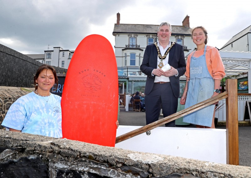 The Mayor of Causeway Coast and Glens Borough Council, Councillor Richard Holmes, pictured with Leanne and Linsey Lyons from The Surf Shack in Castlerock.