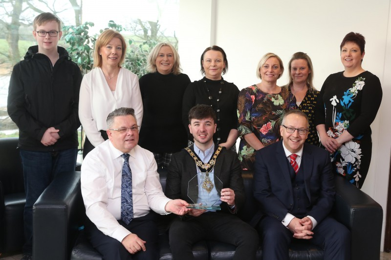Pictured at a special reception held in Cloonavin in honour of Terry McVeigh, a Macmillan Palliative Care Nurse Specialist at Causeway Hospital who recently won the Patients’ Choice Award at this year’s RCN Nurse of the Year Awards, are, front row (L-R), Terry McVeigh, the Mayor of Causeway Coast and Glens Borough Council Councillor Sean Bateson, Dr Ian Warwick, back row (L-R), Joel Jenkins, Terry’s great nephew, Sally Convery, Macmillan Service Lead Palliative Care, Claire McFall, Macmillan Service Improvement Facilitator, Anita Mullan, Terry’s niece, Joanne Currie, Macmillan Specialist, Valerie Mullan, Terry’s niece and Lynda Cox, Macmillan Specialist.