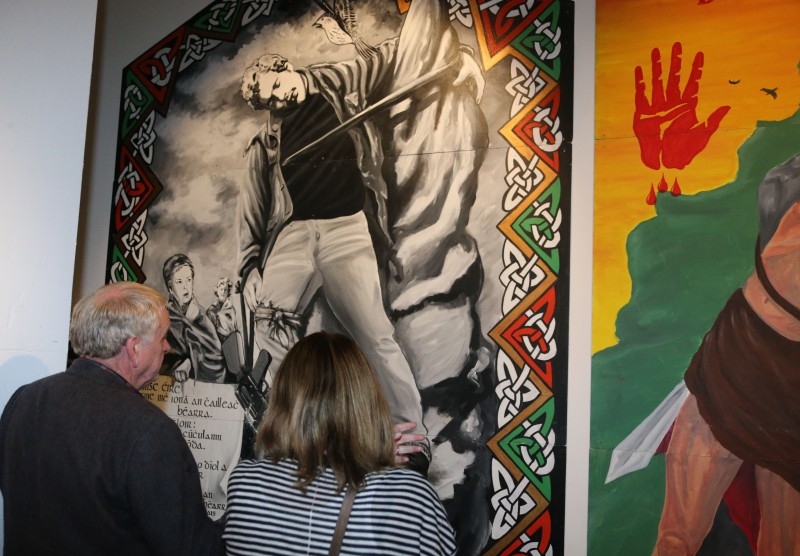 Participants view the ‘Troubles and Beyond’ exhibition in the Ulster Museum.