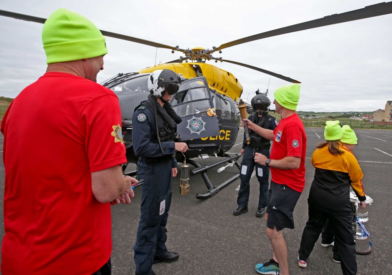The Flame of Hope arrives in Portrush with members of the Law Enforcement Torch Run and Special Olympics athletes.