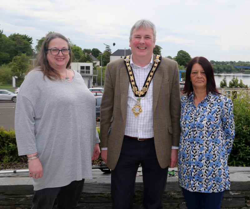 Cathy Adams and Catherine McCauley from Bee Heard pictured with the Mayor of Causeway Coast and Glens Borough Council Councillor Richard Holmes.