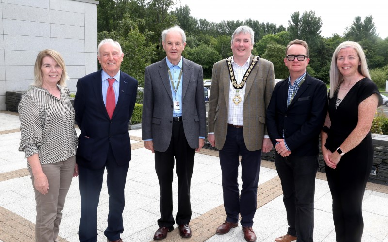 Mary McNickle from Causeway Volunteer Centre pictured with the Mayor of Causeway Coast and Glens Borough Council Councillor Richard Holmes and volunteers from the Royal National Institute for the Deaf at the special reception held in Cloonavin during Volunteers Week.