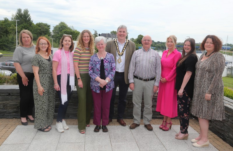 The Mayor of Causeway Coast and Glens Borough Council Councillor Richard Holmes pictured with volunteers from Castlerock Community Association (centre) and (left-right) Community Development Manager Louise Scullion, Community Facilities Development Officer Colleen Moran, Community Development Officer Gabrielle Quinn, Community Development Officer Catherine Farrimond, Head of Community and Culture Julie Welsh, Neighbourhood Renewal Coordinator Jenni Archer and Grainne McCloskey from the Eden Project.