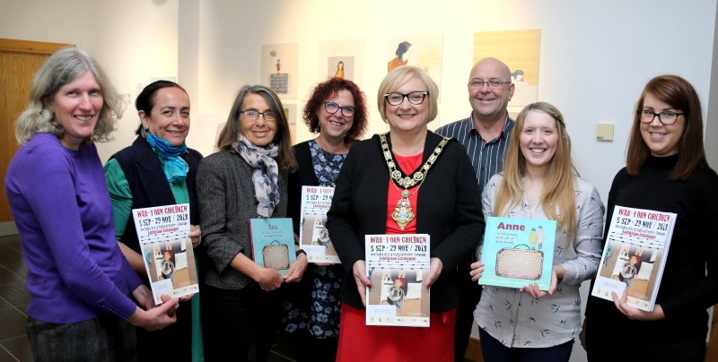 The Mayor of Causeway Coast and Glens Borough Council Councillor Brenda Chivers pictured at the launch of the War-Torn Children exhibition with (left to right) Mary Ryan (Amnesty), Josefina Hurtado, curator Roberta Bacic, Helen Perry,  Billy Coyles, Jamie Austin and Sarah Carson.