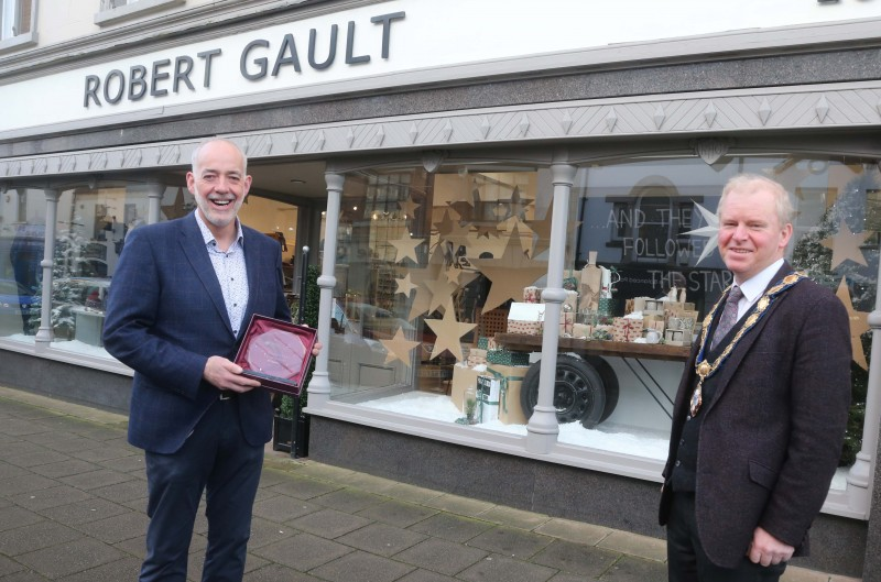 Robert Gault’s was the winner of the Best Christmas Window in Ballymoney. Deputy Mayor of Causeway Coast and Glens Borough Council Alderman Tom McKeown presented the prize to Jonathan Gault.