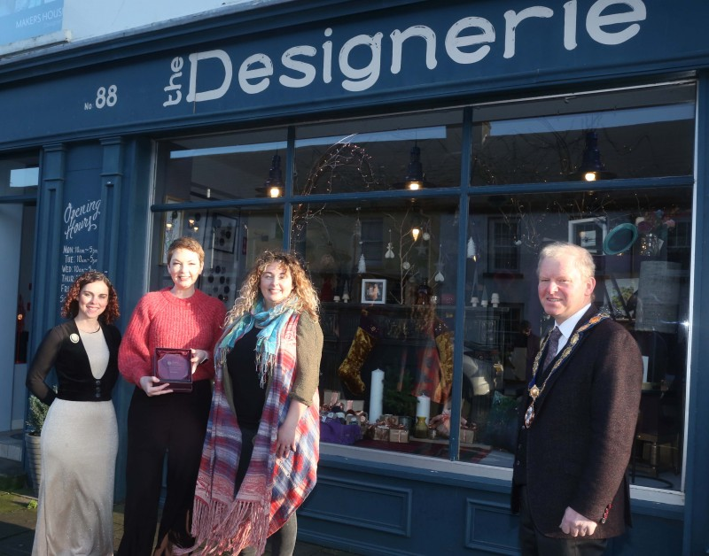 The Designerie was the winner of the Best Christmas Window in Bushmills. Deputy Mayor of Causeway Coast and Glens Borough Council Alderman Tom McKeown presented the prize to Leeann Irwin, Claire McDowell and Sarah Mackay.