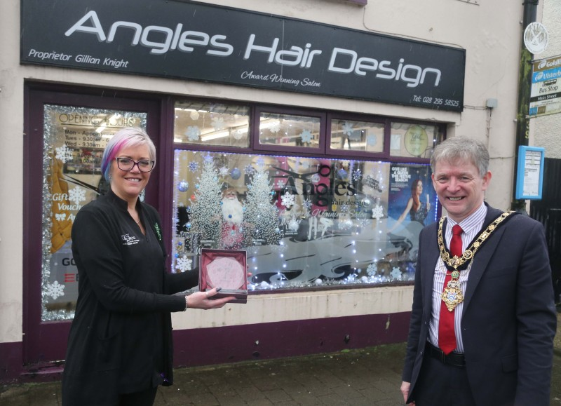 Angles Hair Design was the winner of the Best Christmas Window in Garvagh and the Mayor of Causeway Coast and Glens Borough Council Alderman Mark Fielding presented the award to Gillian Knight.