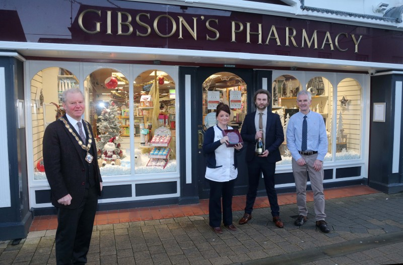 Gibson's Pharmacy was the winner of the Best Christmas Window in Limavady. Deputy Mayor of Causeway Coast and Glens Borough Council presented the prize to Jenny Miller, Sean Devlin and David Gibson.