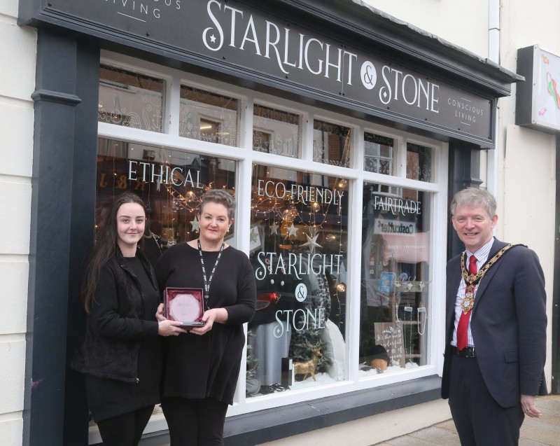 Starlight & Stone was the winner of the Best Christmas Window in Portrush and the Mayor of Causeway Coast and Glens Borough Council Alderman Mark Fielding presented the award to Ellen and Maryrose Stewart.