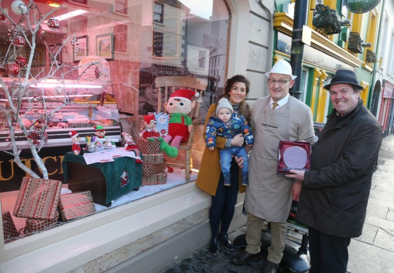 Terence Donnelly’s Butchers on Ann Street was the winner of Causeway Coast and Glens Borough Council’s Christmas window competition in Ballycastle. Terence is pictured receiving his award from Town and Village Officer Shaun Kennedy alongside his daughter Bronagh and grandson Ollie.