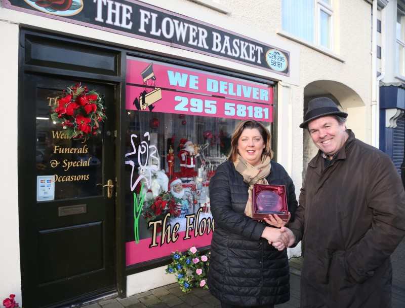 The Flower Basket on Main Street Garvagh was the winner of Causeway Coast and Glens Borough Council’s Christmas window competition in Garvagh. Gillian McGarrell is pictured receiving the award from Town and Village Officer Shaun Kennedy.
