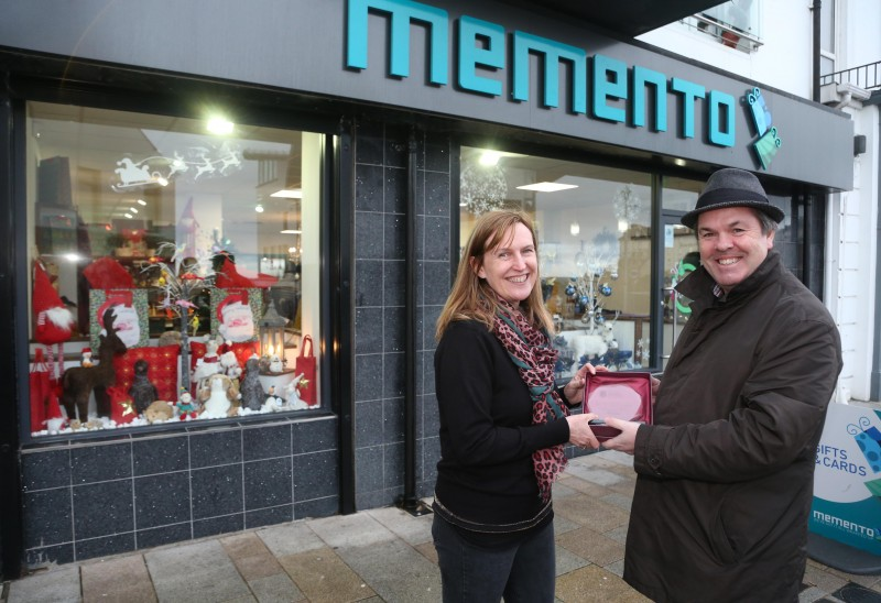 Memento on Causeway Street Portrush was the winner of Causeway Coast and Glens Borough Council’s Christmas window competition in Portrush. Maggie Sutherland is pictured receiving the award from Town and Village Officer Shaun Kennedy.