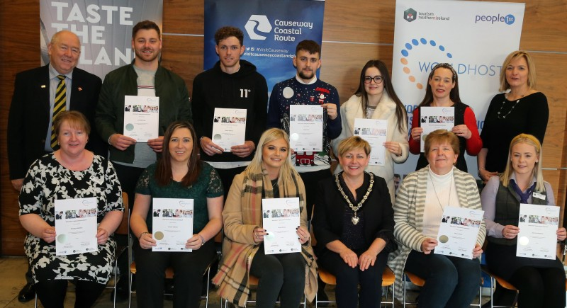 The Deputy Mayor of Causeway Coast and Glens Borough Council Alderman Sharon McKillop, Trade Engagement Officer Clare Quinn and World Host trainers Steven Chambers and Wendy Gallagher pictured with Causeway Hotel staff Jemma O’Kane, Donna Dun, Jessica Steele, Jay Burton, Monique Madden, Steven Holmes, Luke McKinley, Sammie McMullan and Nicole Shaw who all received a World Host Food Ambassador qualification.