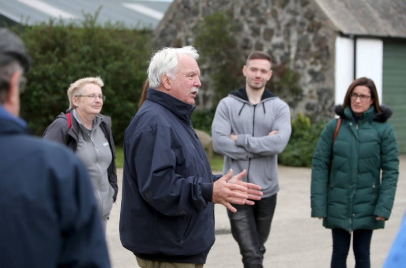 Robin Cole talks to the Fam Trip participants about Broughgammon Farm.