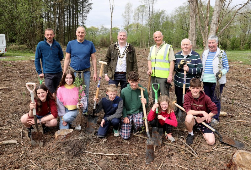 The Mayor of Causeway Coast and Glens Borough Council Councillor Richard Holmes pictured at Drumaheglis Holiday Park and Marina with volunteers who planted 300 new trees as part of The Queen’s Green Canopy. Also included is Council’s Holiday and Leisure Parks General Manager Steve McCartney (third from right).
