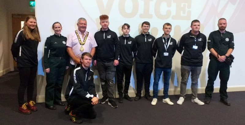 The Mayor of Causeway Coast and Glens Borough Council Councillor Ivor Wallace pictured at the Our Space Our Voice conference in Coleraine with Youth Voice members.