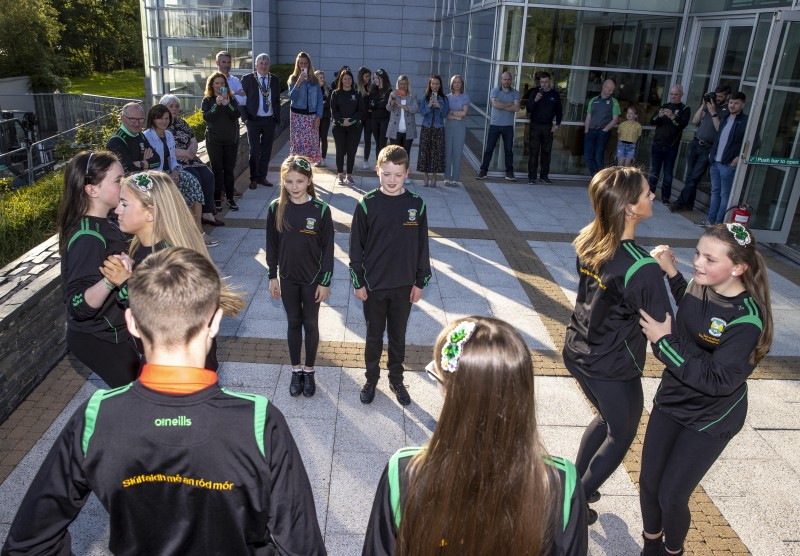 The Mayor of Causeway Coast and Glens Borough Council, Councillor Richard Holmes, enjoys the performance from the Scór na nÓg set-dancing team from Glenullin GAC