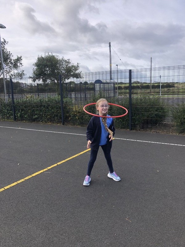 Practicing her hula-hoop technique during the Heritage Games organized by Causeway Coast and Glens Borough Council at Carnalridge Primary School, Portrush.