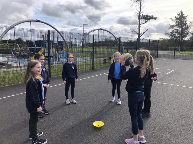 Pupils from Carnalridge Primary School enjoy some Heritage Games in the playground organized by Causeway Coast and Glens Borough Council as part of its NI 100 programme.