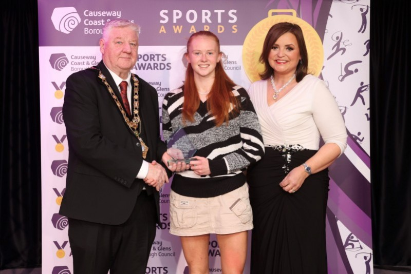 Junior Sportswoman of the Year, Kia McCartney accepts her award from Denise Watson and Mayor, Councillor Steven Callaghan.