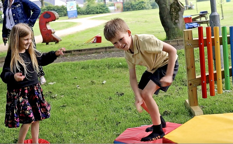 Children enjoying the new inclusive play equipment at Council's all inclusive family events in Flowerfield.