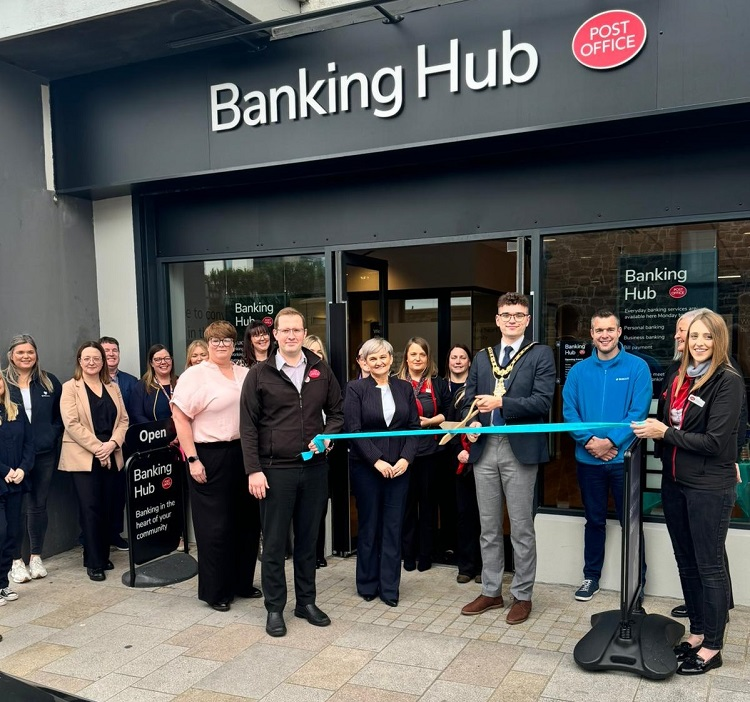 Mayor of Causeway Coast Councillor Ciarán McQuillan pictured with representatives from Cash Access UK and local staff, as he officially opened the new Banking Hub located at 15 Eglinton Street Portrush. [photo credit: Cash Access UK]