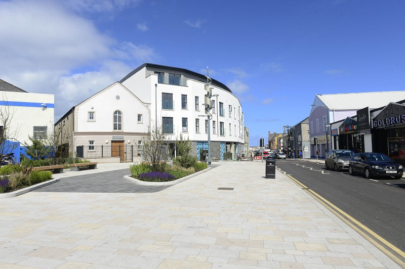 As part of the Regeneration Programme, DfC has offered grant assistance to private developers to bring vacant and derelict land back into economic use.  This is a long term project that will continue to deliver after The 148th Open.   Pictured is a new development on Dunluce Avenue that is nearing completion and will provide 13 new apartments and 2 commercial units.  Public realm improvements in Dunluce Avenue are also pictured.