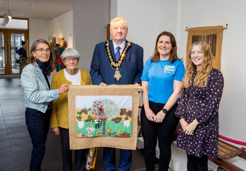 Roberta Bacic Conflict Textiles, Marlene Milner Textile Artist, Mayor of Causeway Coast and Glens Borough Council Councillor Steven Callaghan, Grace McAlister CCGHT, and Jamie Austin Causeway Coast and Glens Borough Council Museum Services.